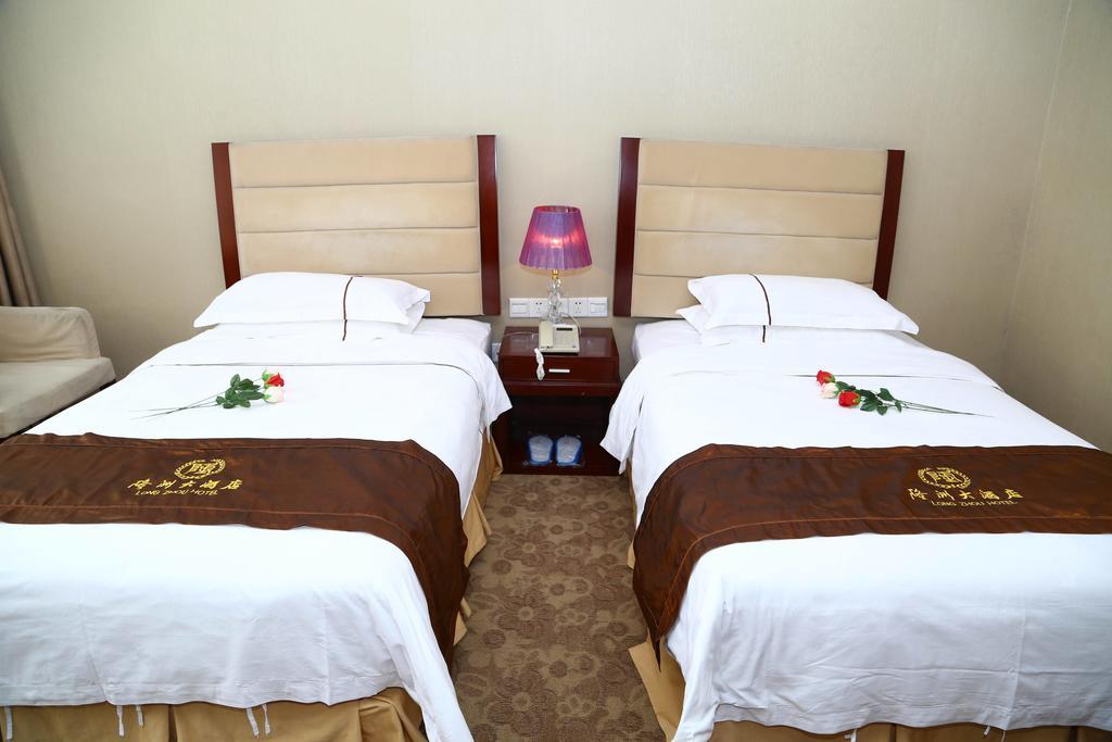 Long Zhou Grand Hotel Гуанчжоу Номер фото