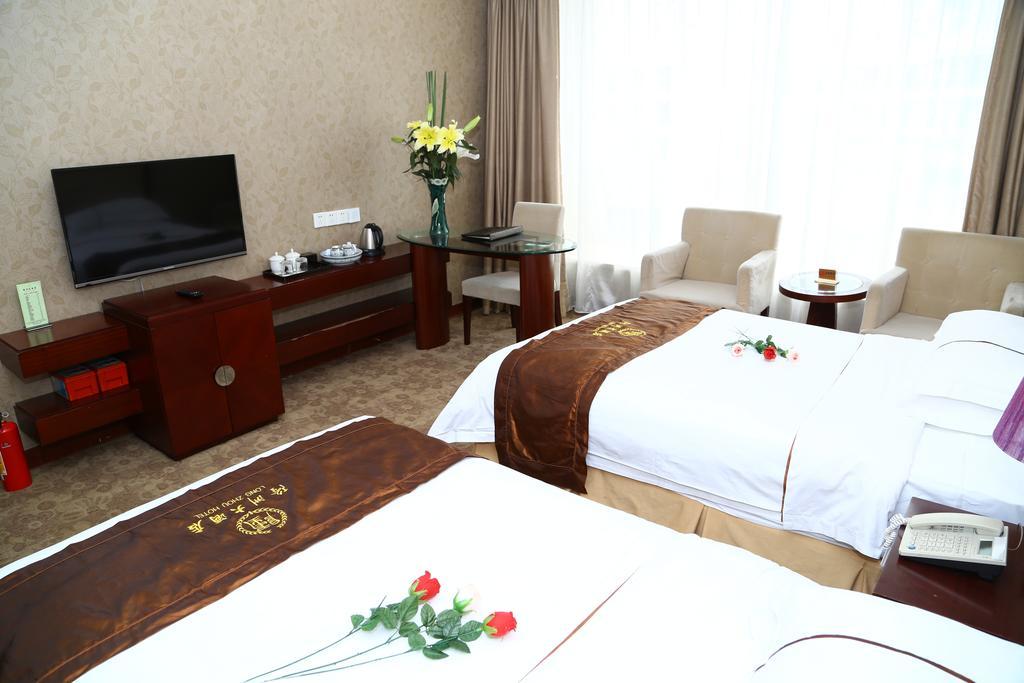 Long Zhou Grand Hotel Гуанчжоу Экстерьер фото