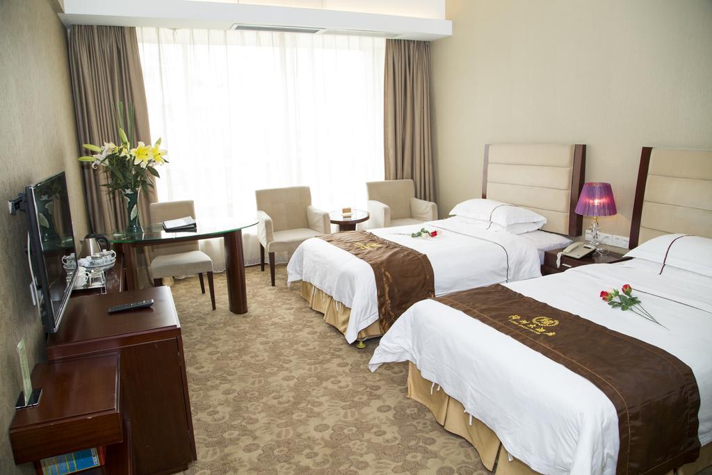 Long Zhou Grand Hotel Гуанчжоу Номер фото